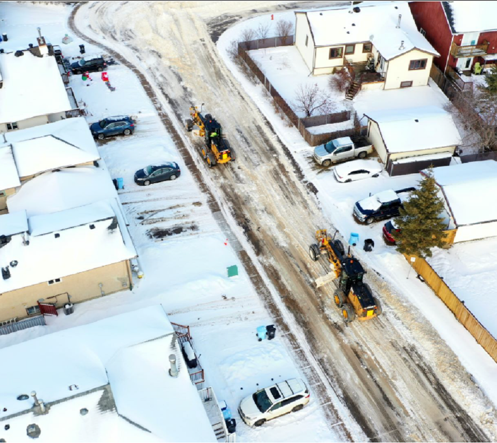 RMWB Snow plows at work. Aerial photo from rwmb.ca